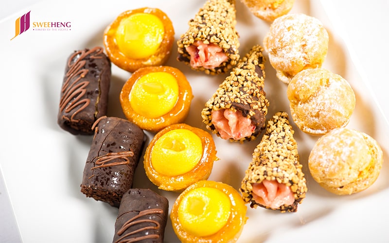 Variety of mini pastries arranged for delivery in Singapore