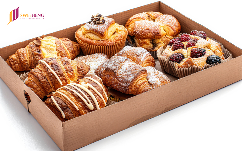 A pastry box filled with diverse options to be delivered for an online pastry box order