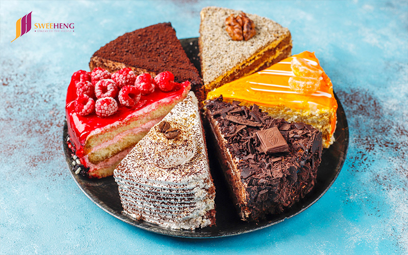 A variety of sliced cakes on a plate