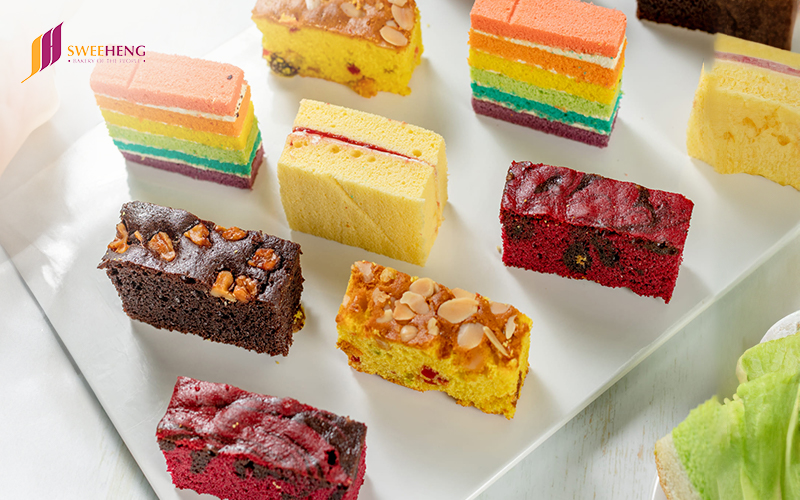 Variety of sliced cakes