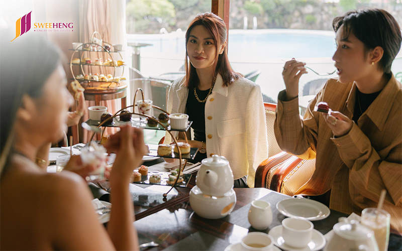 A group of people enjoying Halal high tea catering